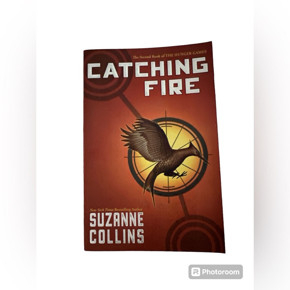 Catching Fire by Suzanne Collins 📕